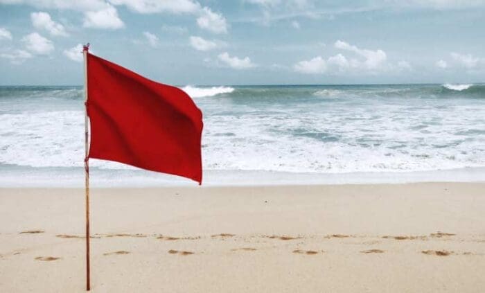 a red flag is a warning not a challenge